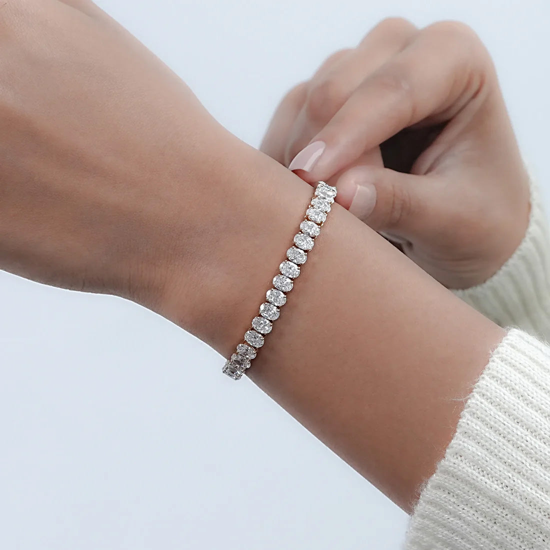 5ct oval cut lab grown diamond tennis bracelet worn on the wrist, IGI certified, Draco Diamond