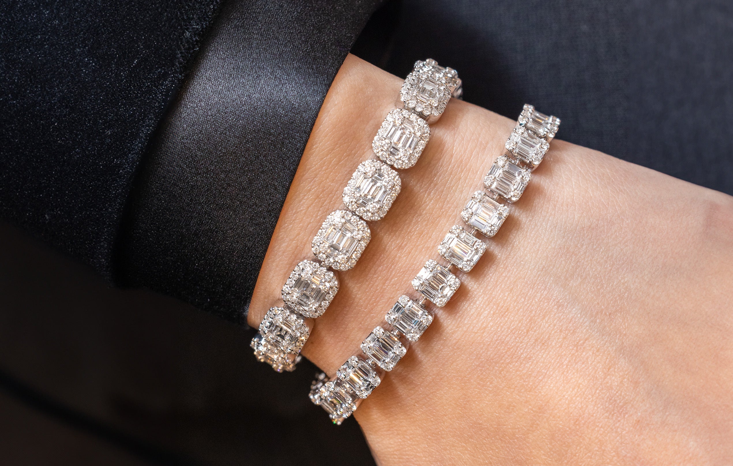 Diamond tennis bracelets stacked on a wrist against black, lab grown diamond market report 2026, Draco Diamond