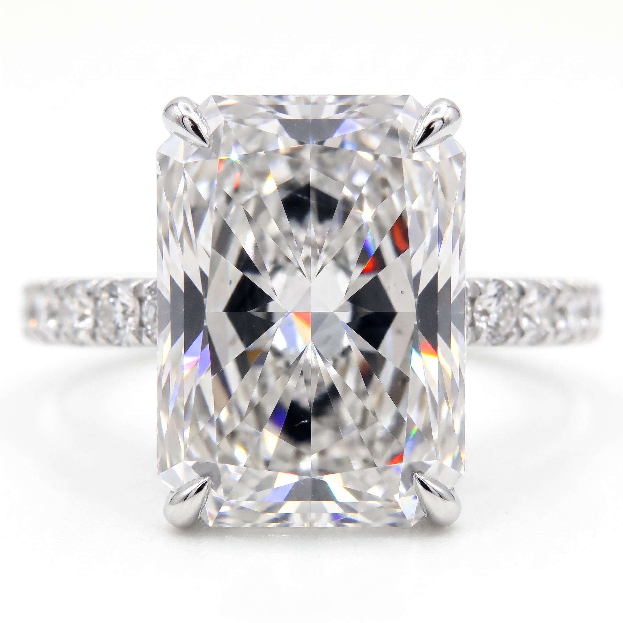 5 carat radiant lab grown diamond engagement ring close up, hidden halo, white background