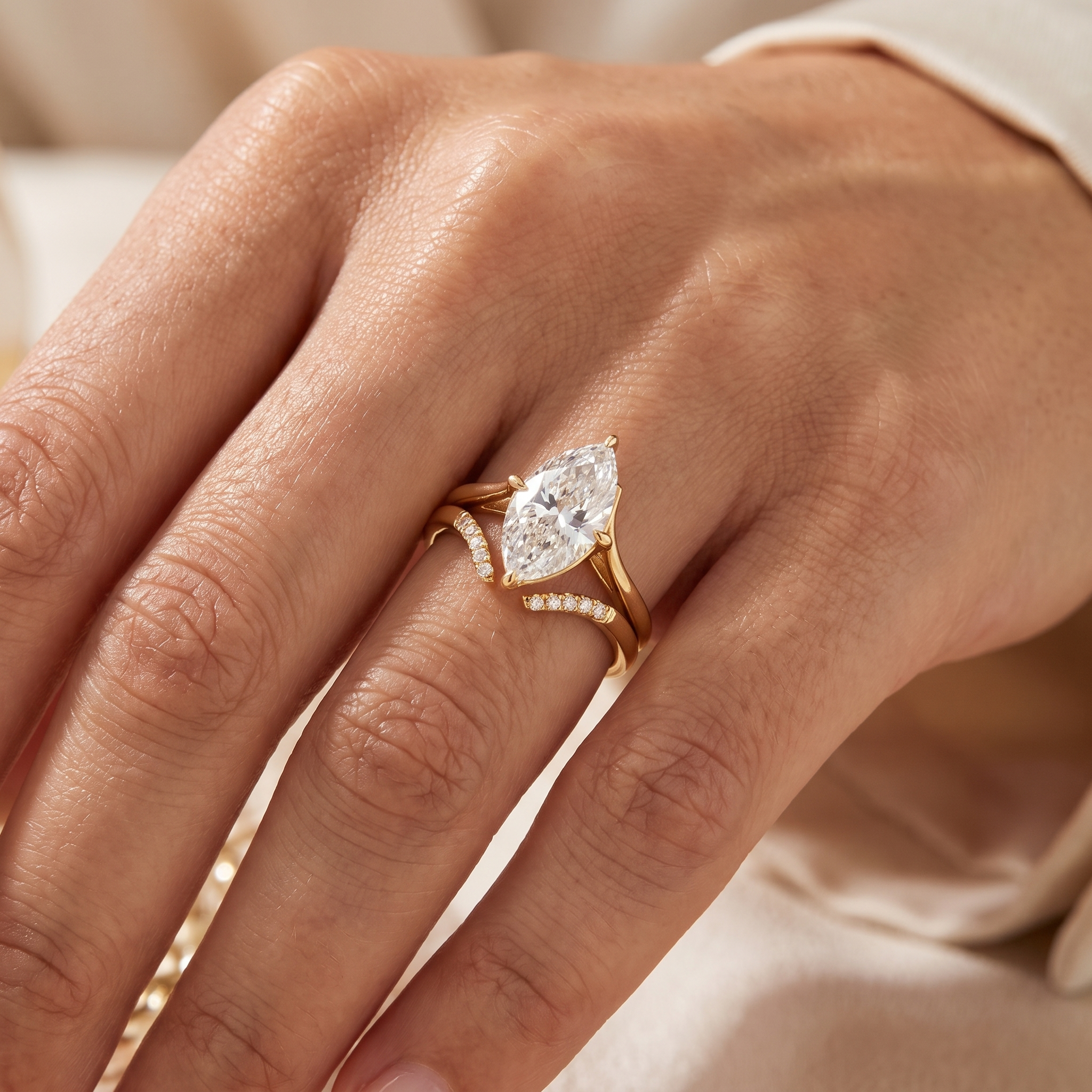 3ct marquise diamond bridal set worn on a womans hand, plain split shank solitaire pave chevron band