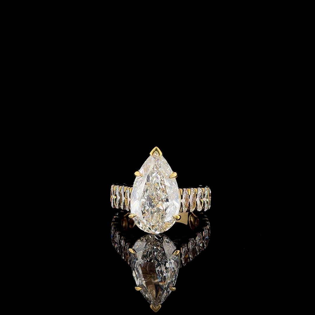 12.4ctw pear bridal lab grown diamond eternity band set, on a black background