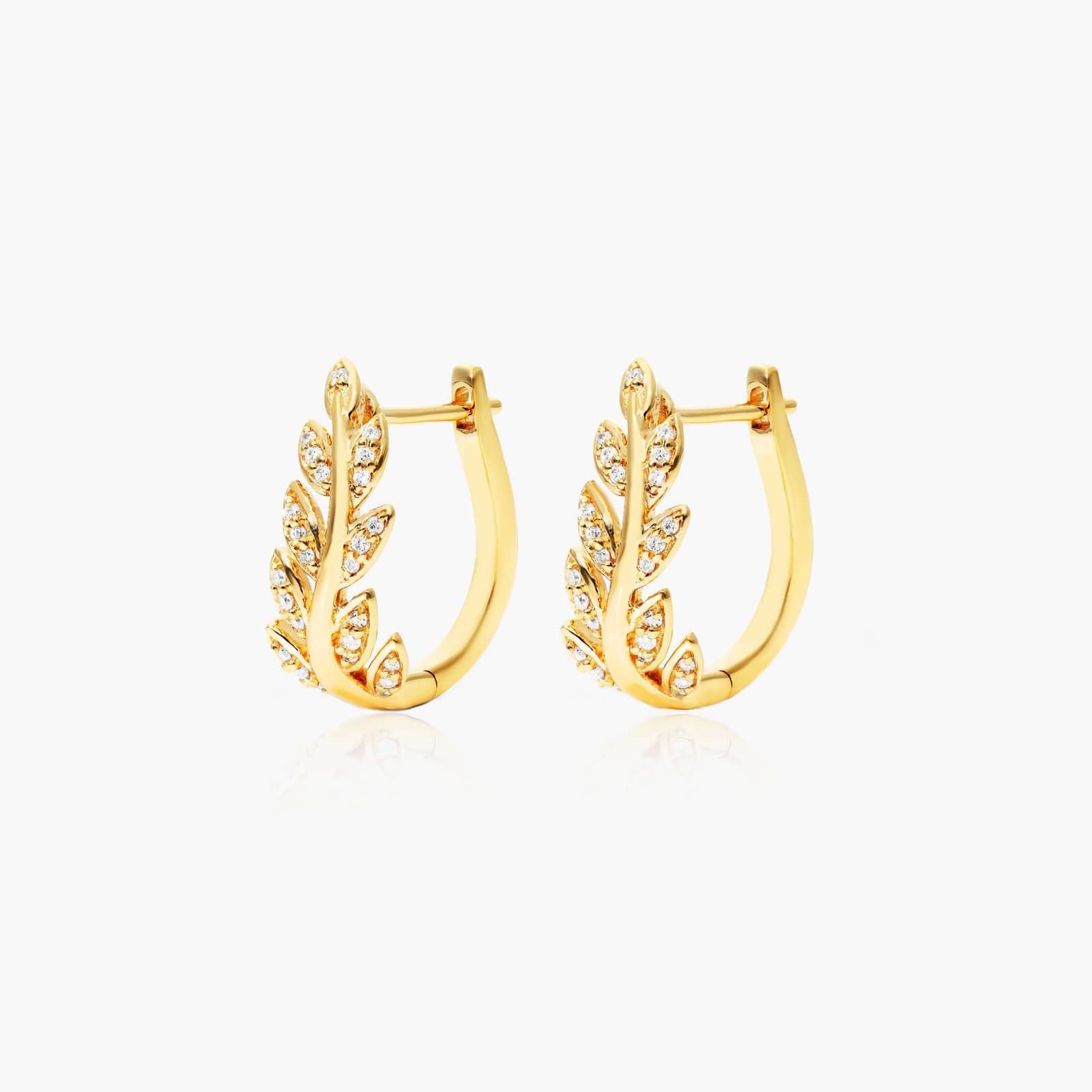 1ctw Lab Diamond Leaf Earrings on model | styled 10K yellow gold stud earrings