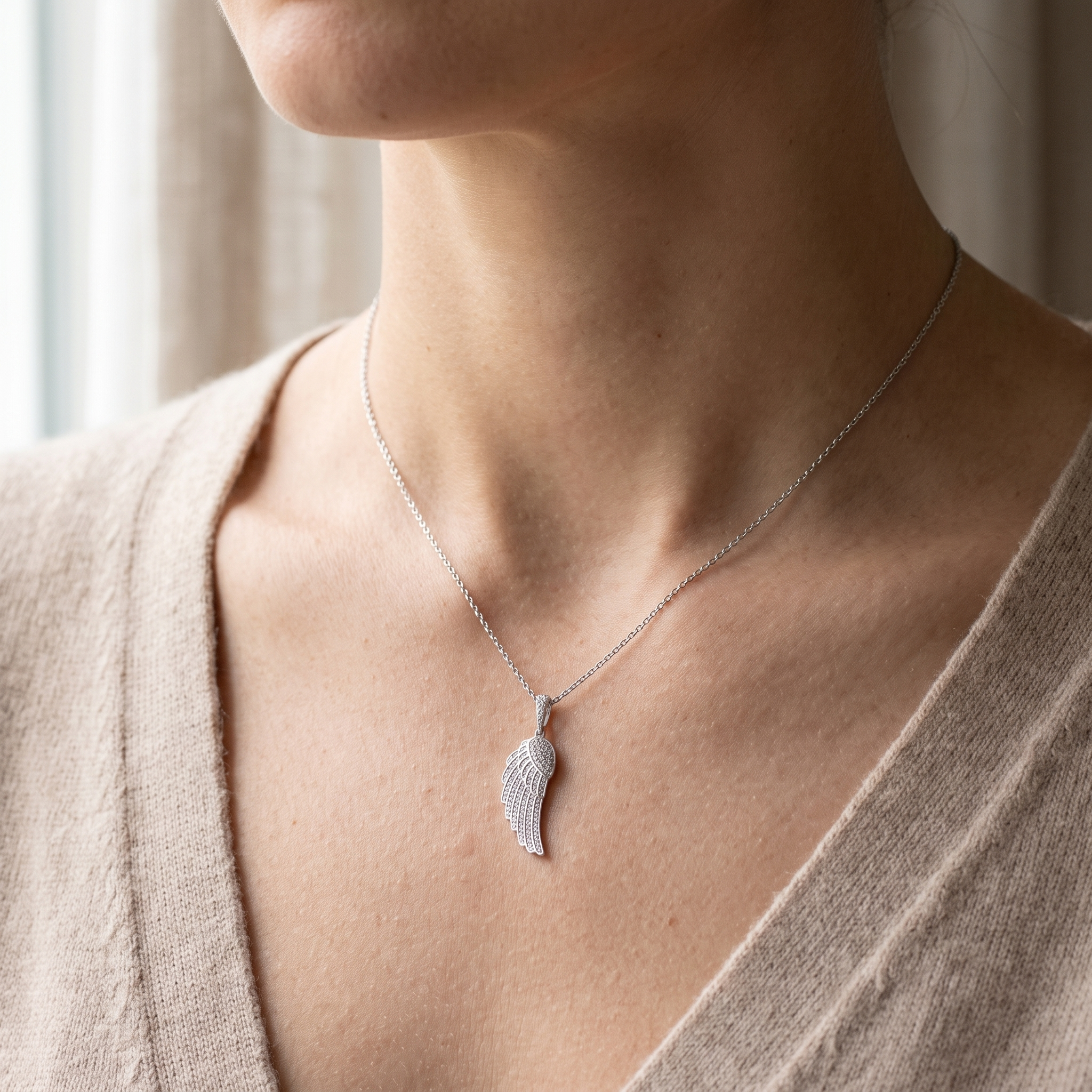 2.1ct angel wing lab grown diamond pendant shown worn