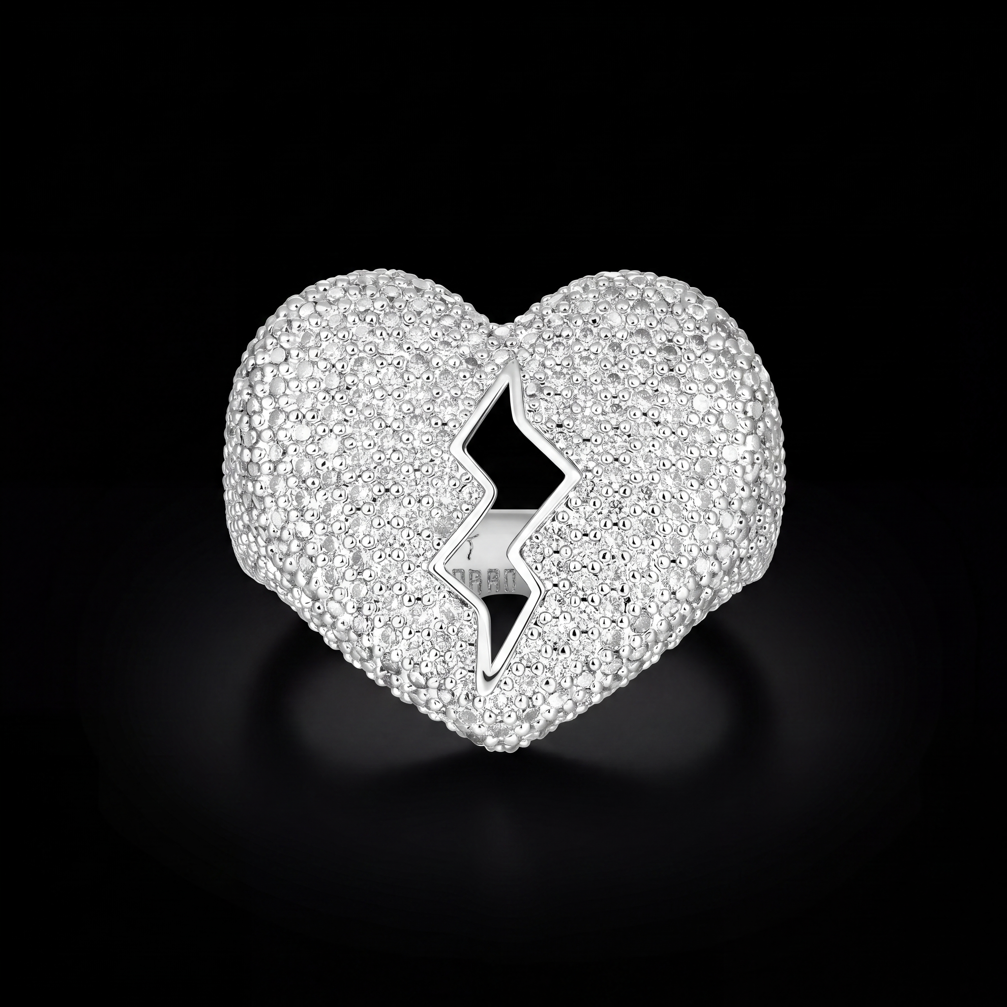 4ct broken heart lab diamond ring on black, pave set heart with polished lightning bolt crack