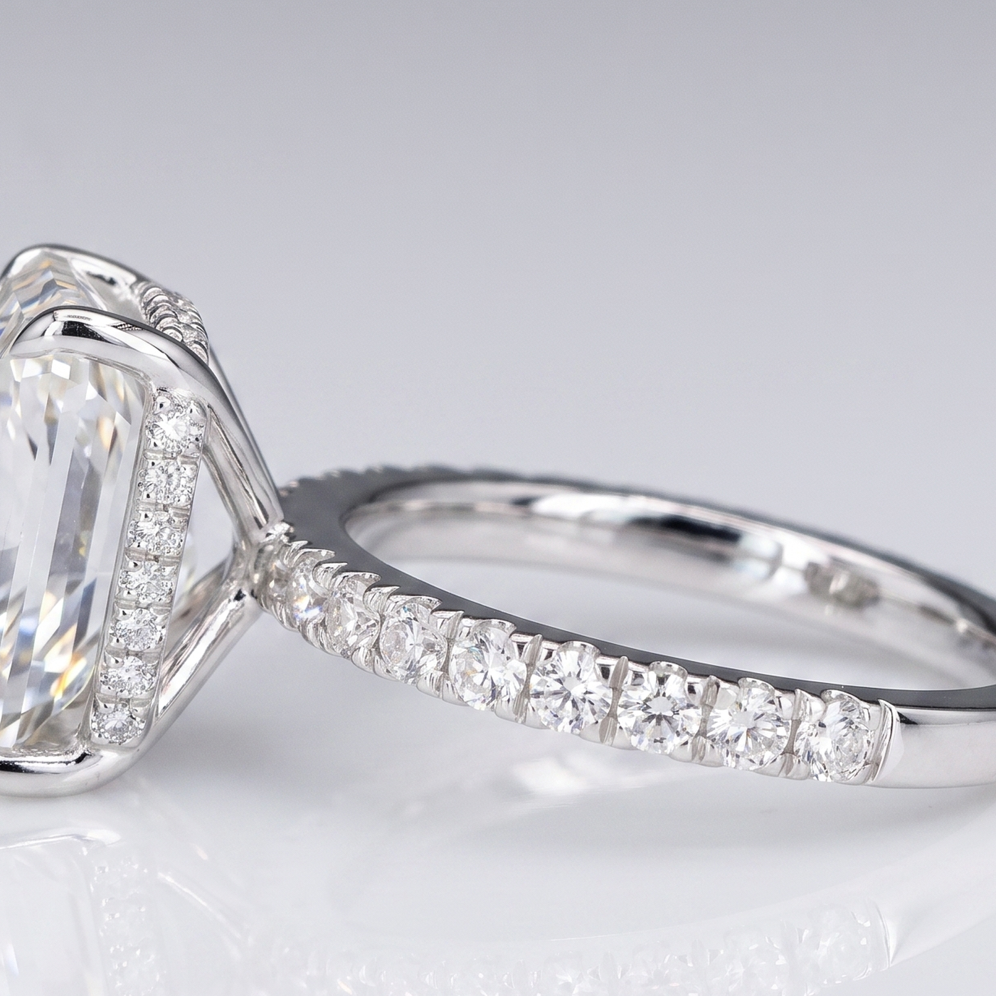 Macro detail of the hidden halo and diamond pave band on the 5ct radiant lab grown diamond engagement ring