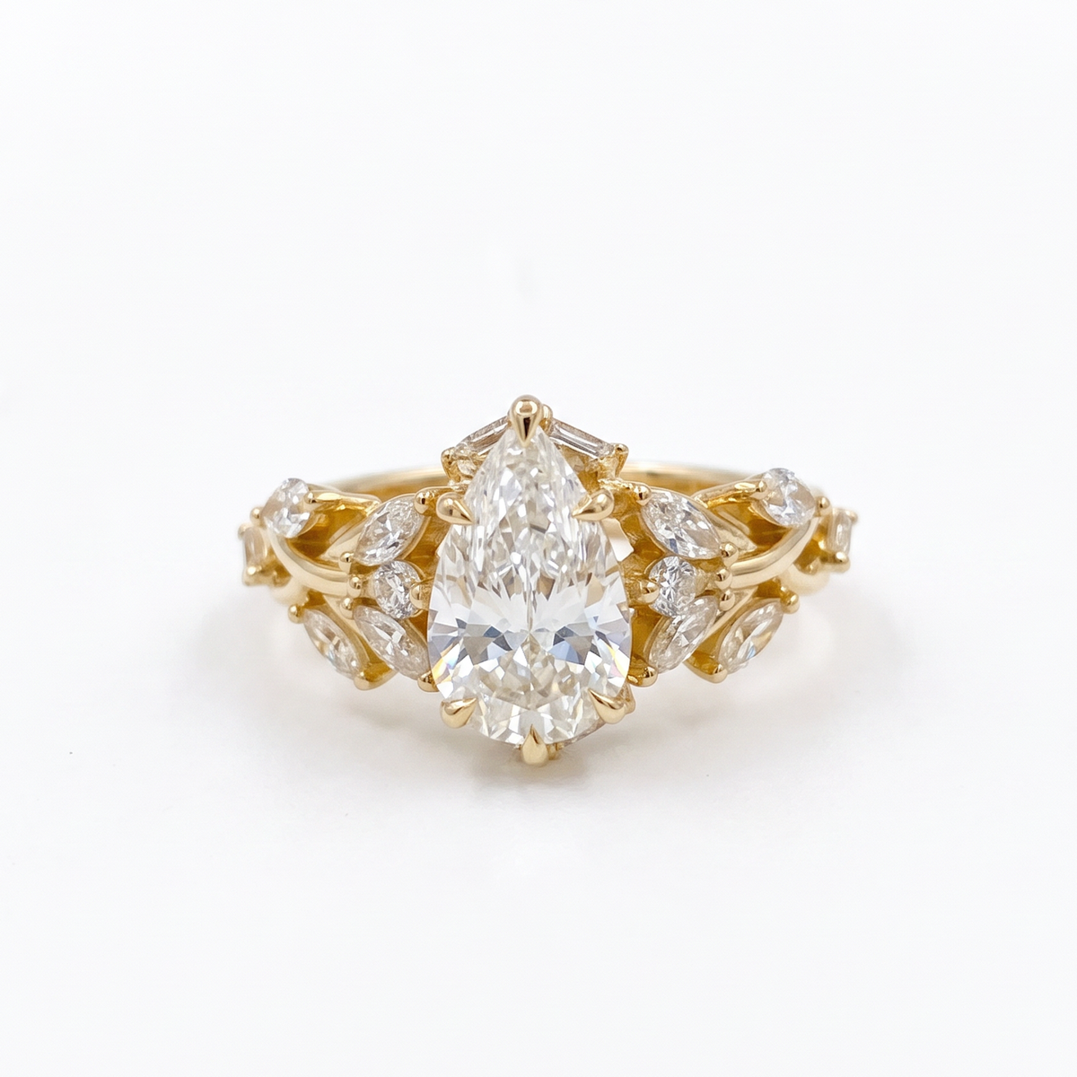 2ct pear vine lab grown diamond engagement ring, 14k yellow gold, front view on white