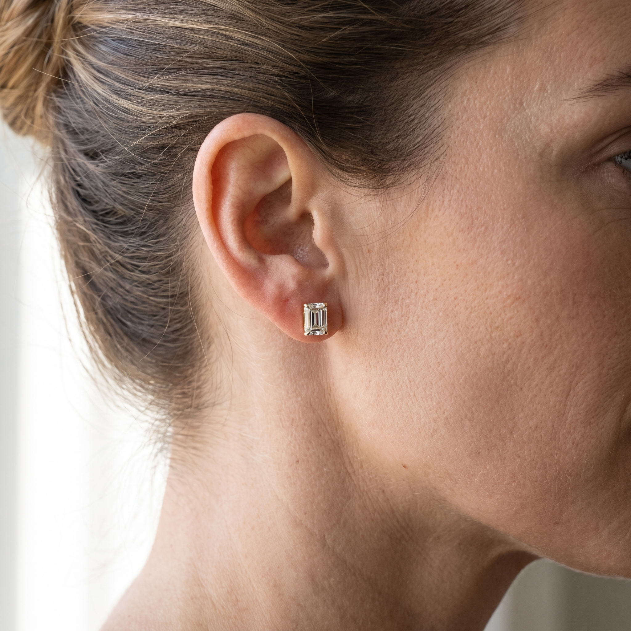 1ctw emerald cut studs lab grown diamond earrings shown worn