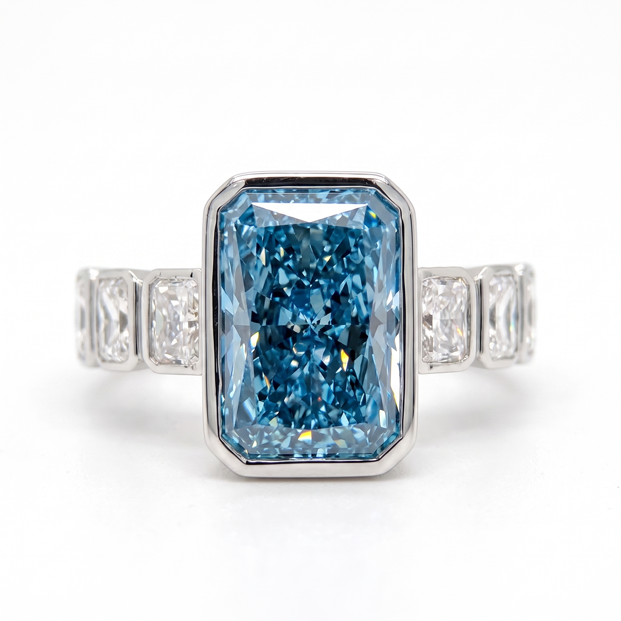 5.73ct fancy blue radiant lab grown diamond bezel ring close up, white background