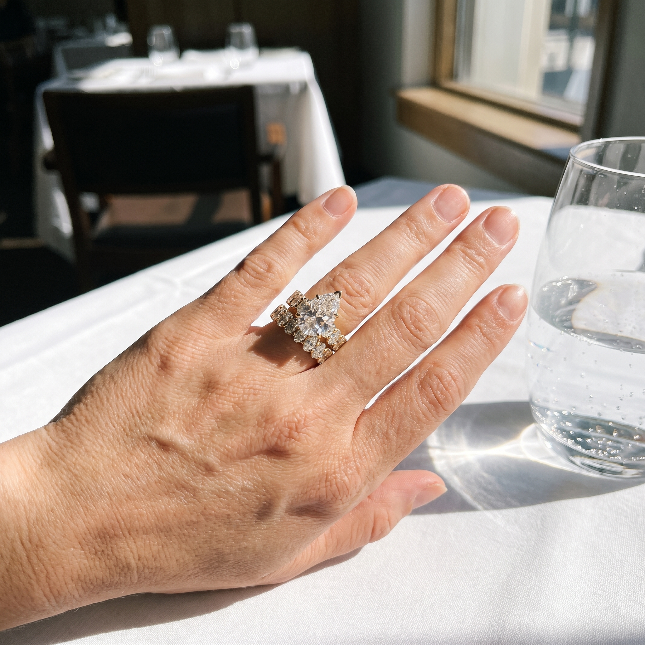 12.4ctw pear bridal lab grown diamond eternity band set shown worn