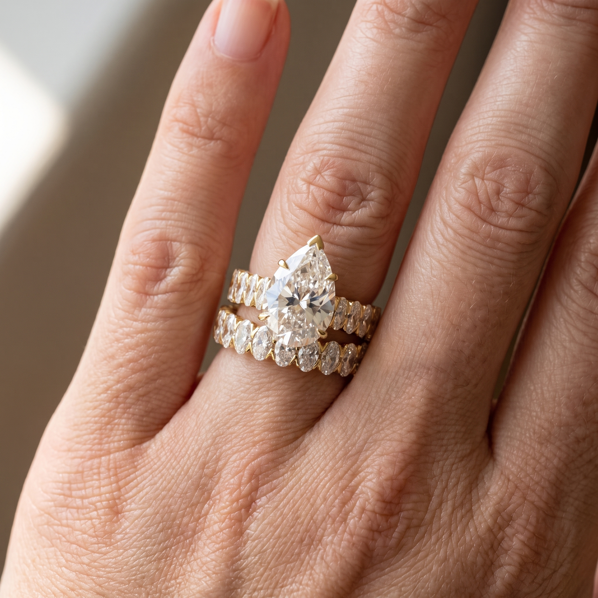 12.4ctw pear bridal lab grown diamond eternity band set shown worn