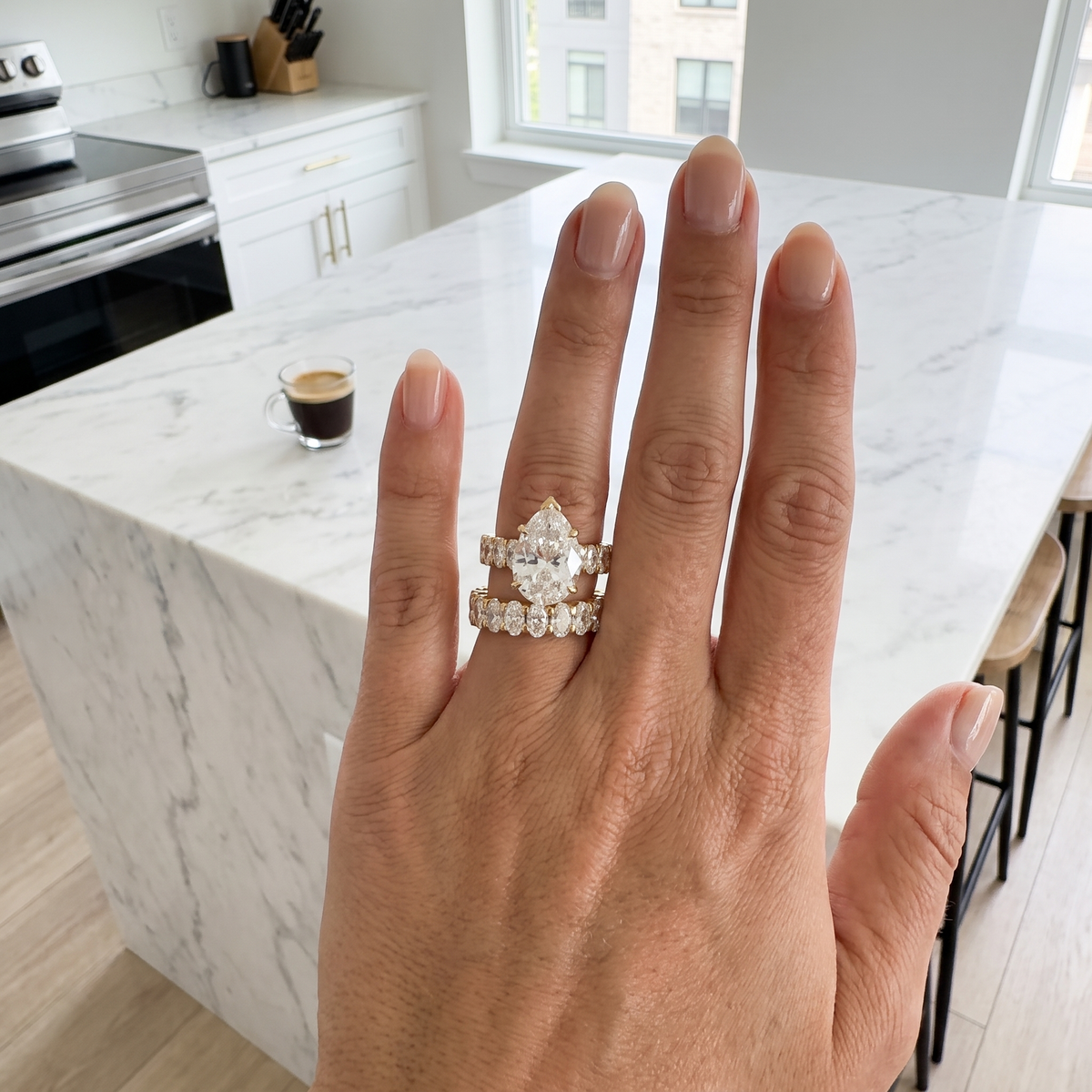 12.4ctw pear bridal lab grown diamond eternity band set shown worn