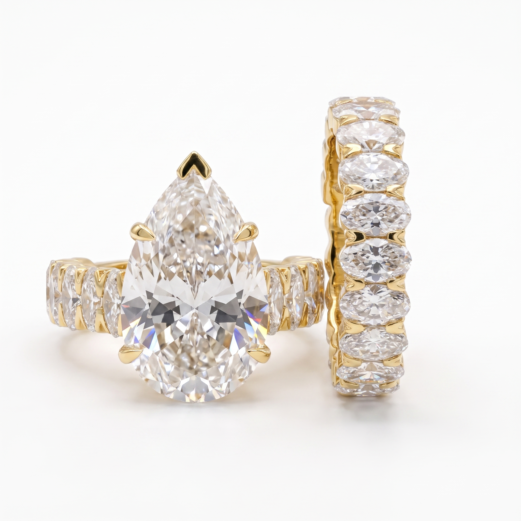 12.4ctw pear bridal lab grown diamond eternity band set, front view on a white background