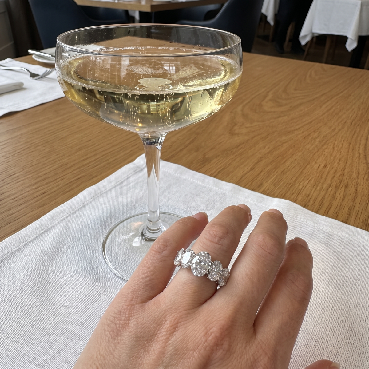 8.5ct oval five stone lab grown diamond ring shown worn