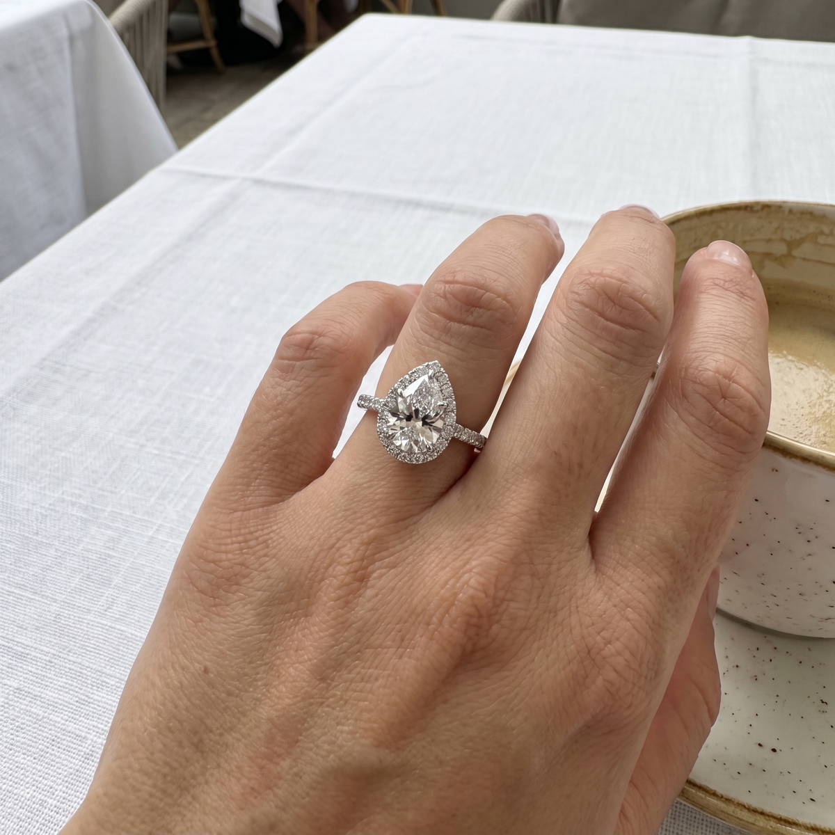 2.5ct halo lab grown diamond ring shown worn