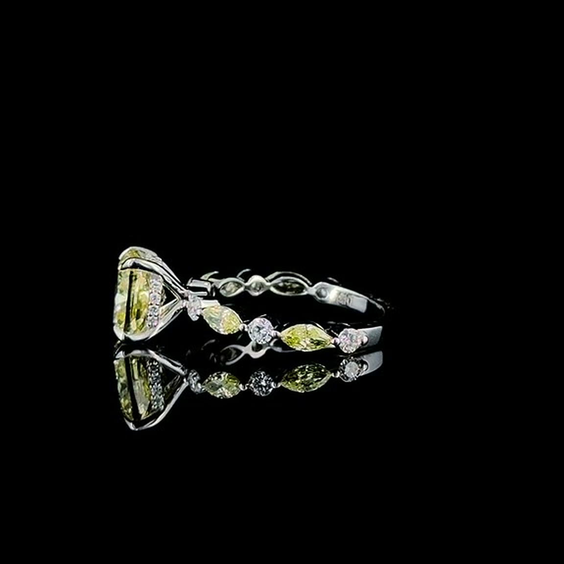 3ct fancy yellow cushion lab grown diamond ring on black, side profile showing the hidden halo and marquise shoulders