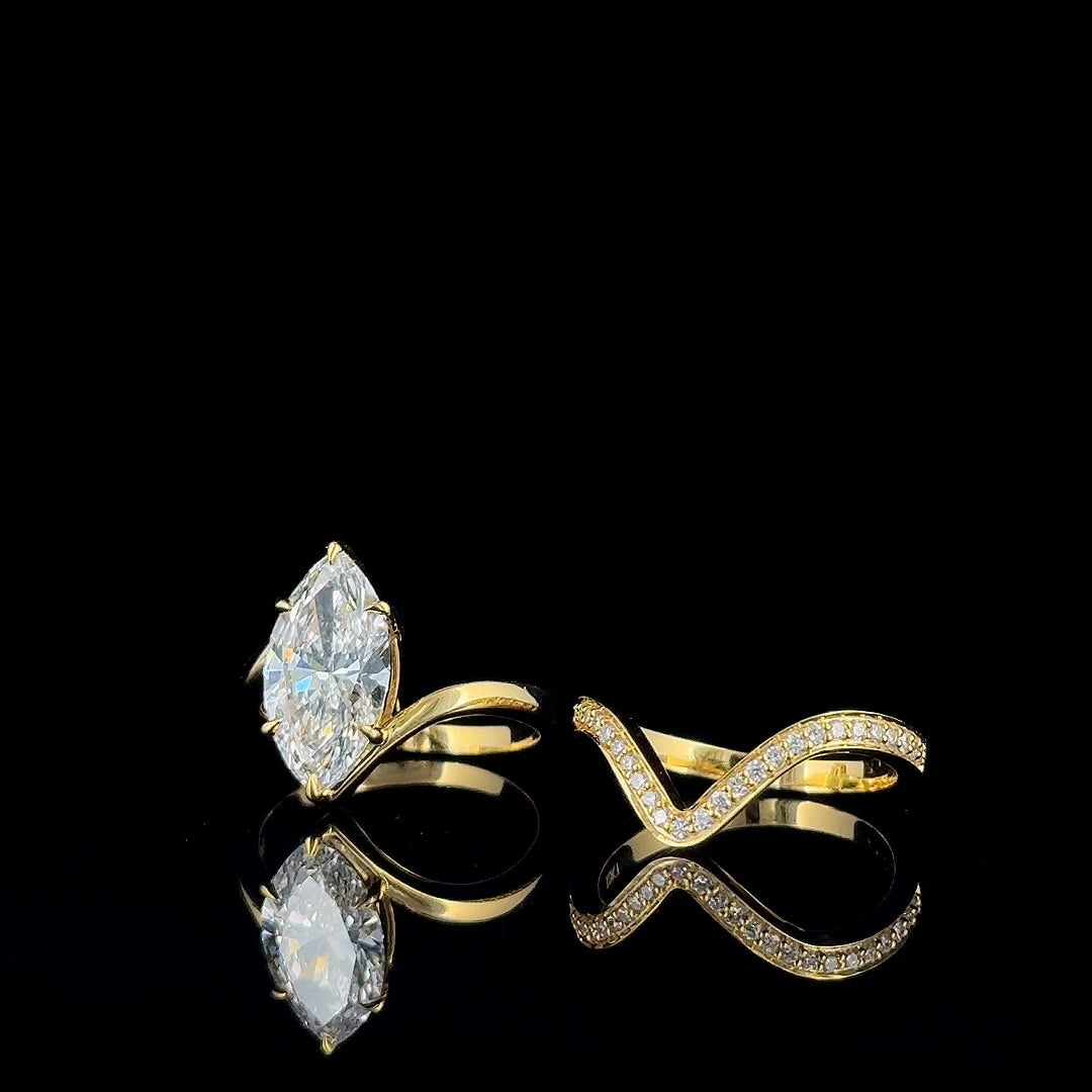 3ct marquise bypass lab grown diamond ring and chevron band set, yellow gold, product video still