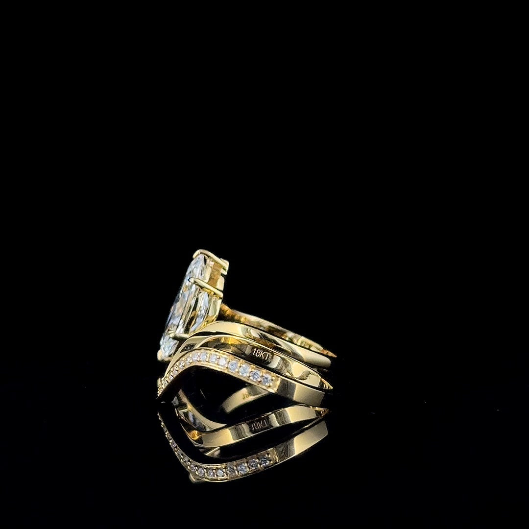 marquise bypass engagement ring nested with chevron pave band, side view