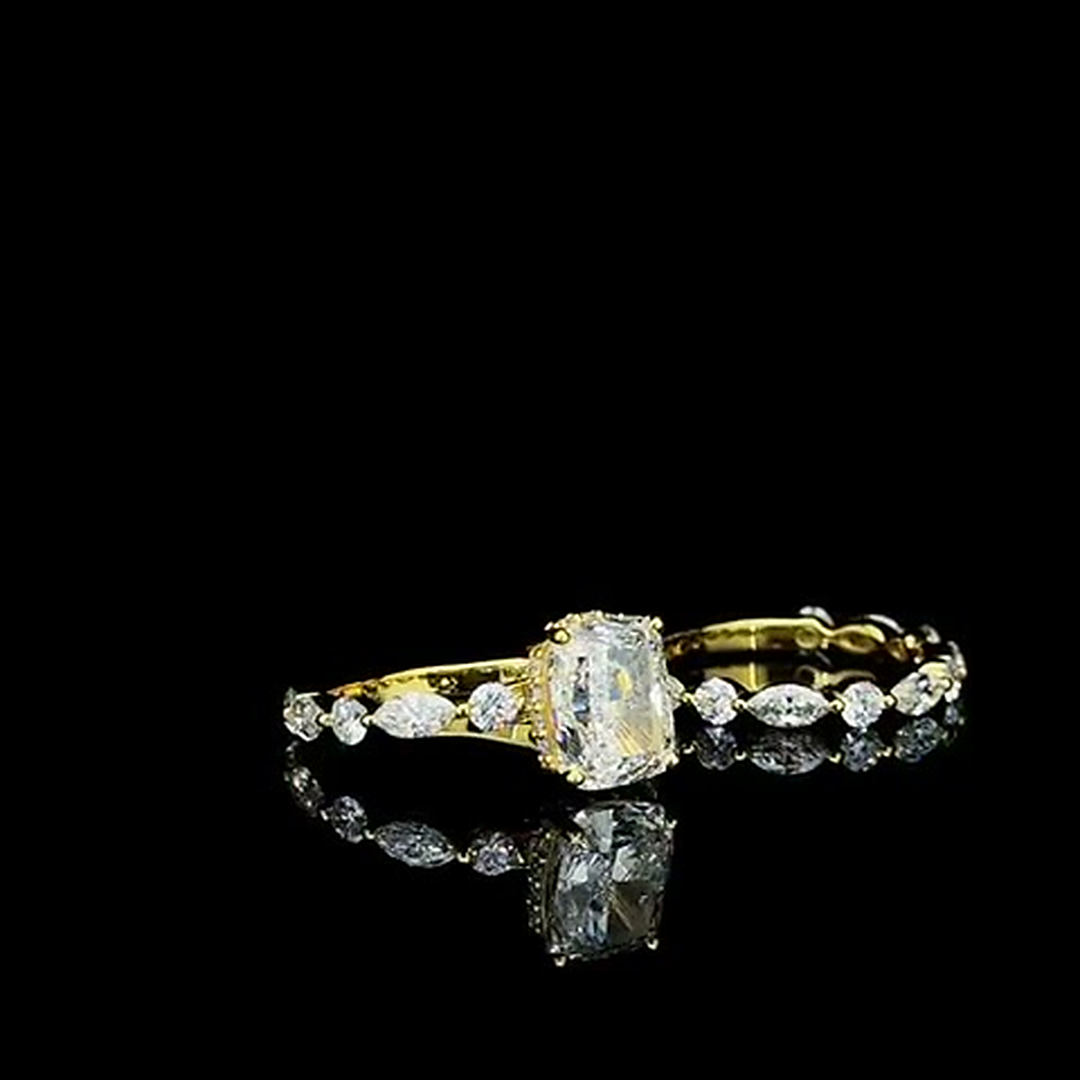 marquise and round diamond eternity band in yellow gold on black, side view