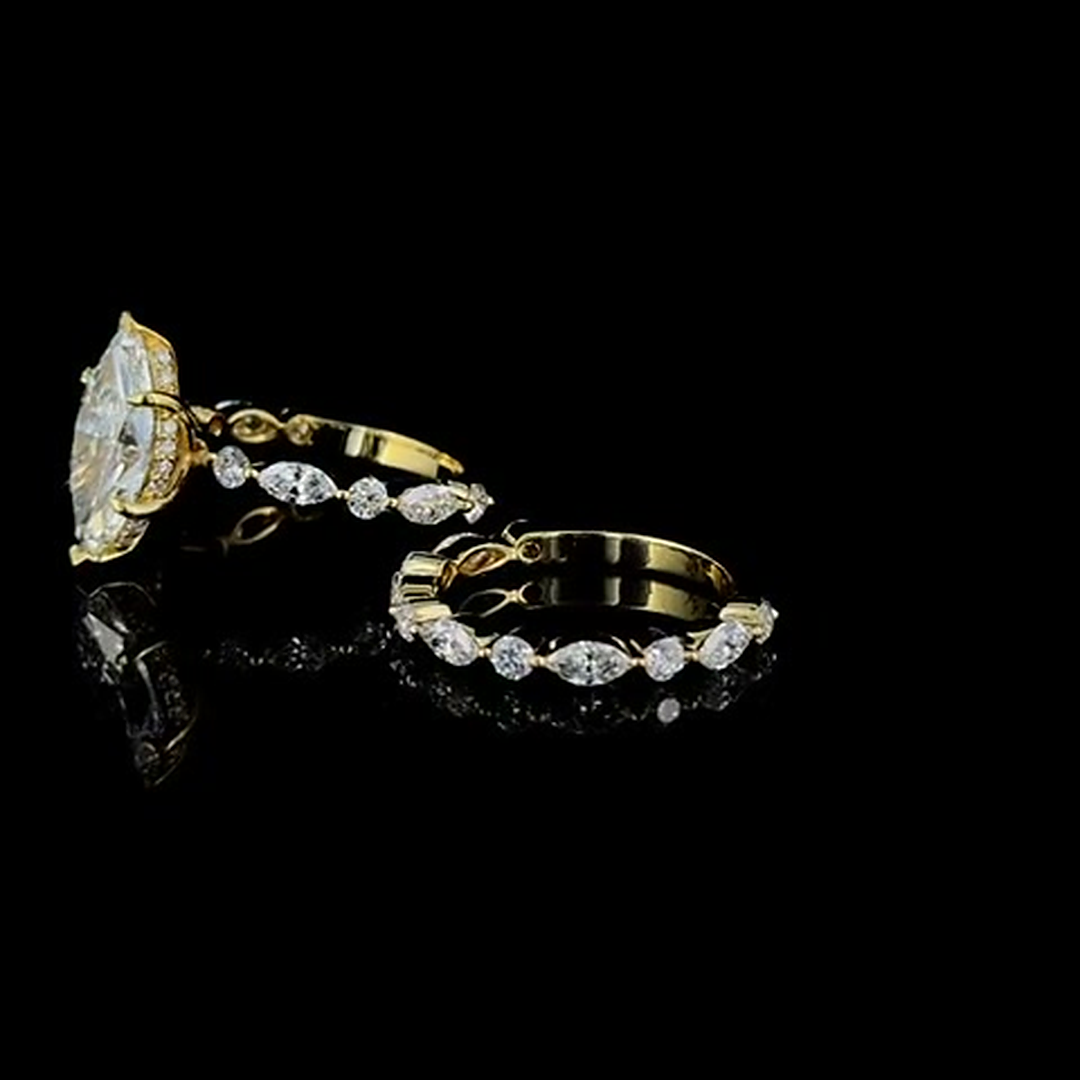 3ct marquise lab grown diamond bridal set on black, three-quarter view showing marquise and round accents