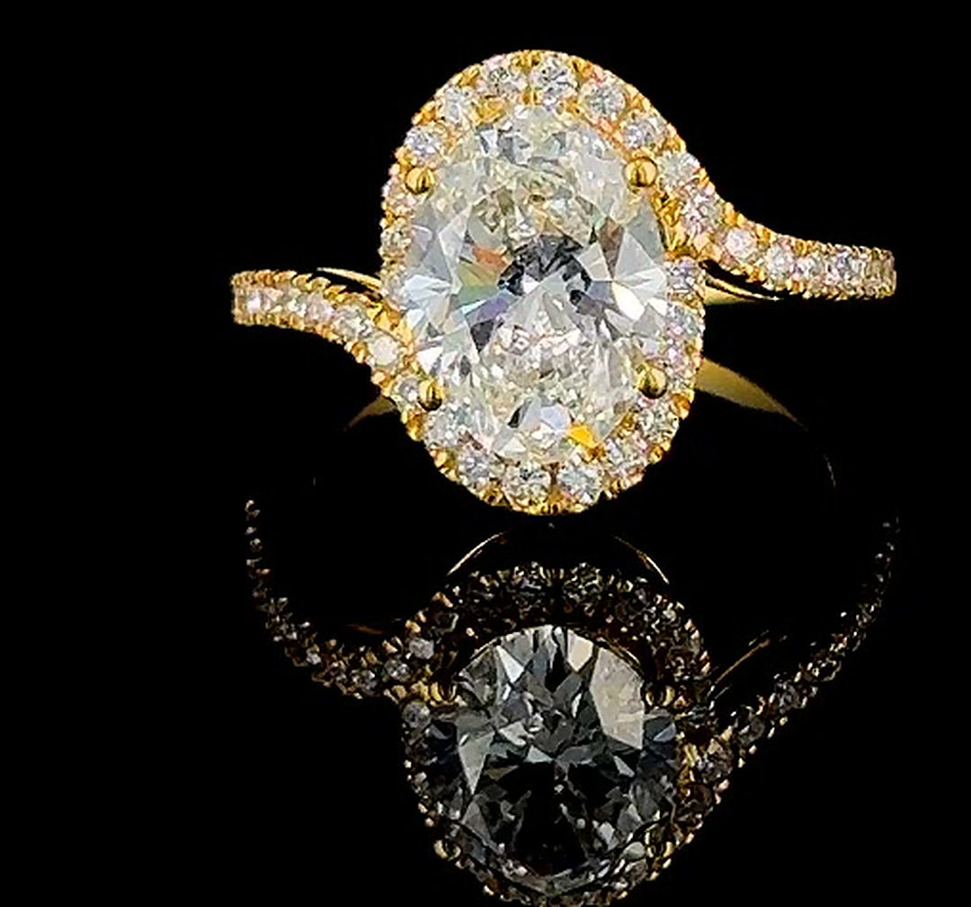 3ct oval halo lab grown diamond engagement ring in yellow gold on black