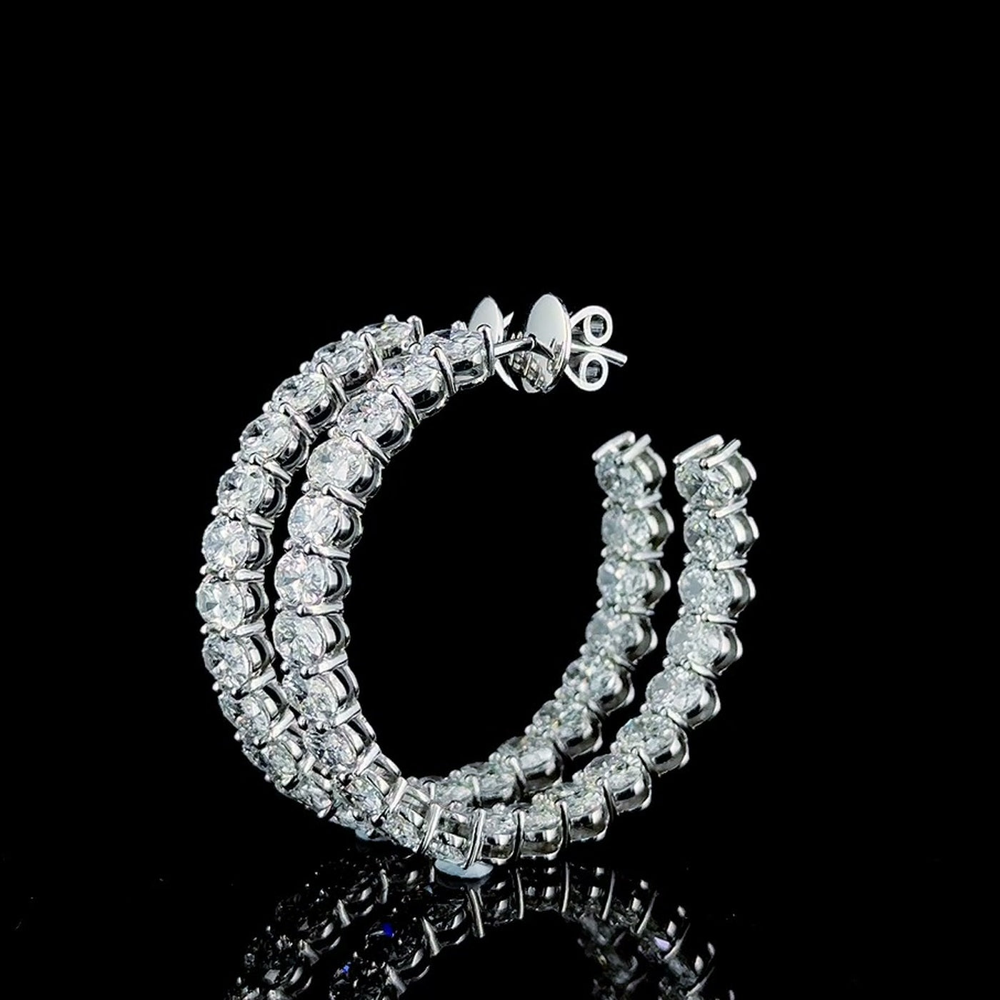 oval inside out lab diamond hoops angled, inner stones visible