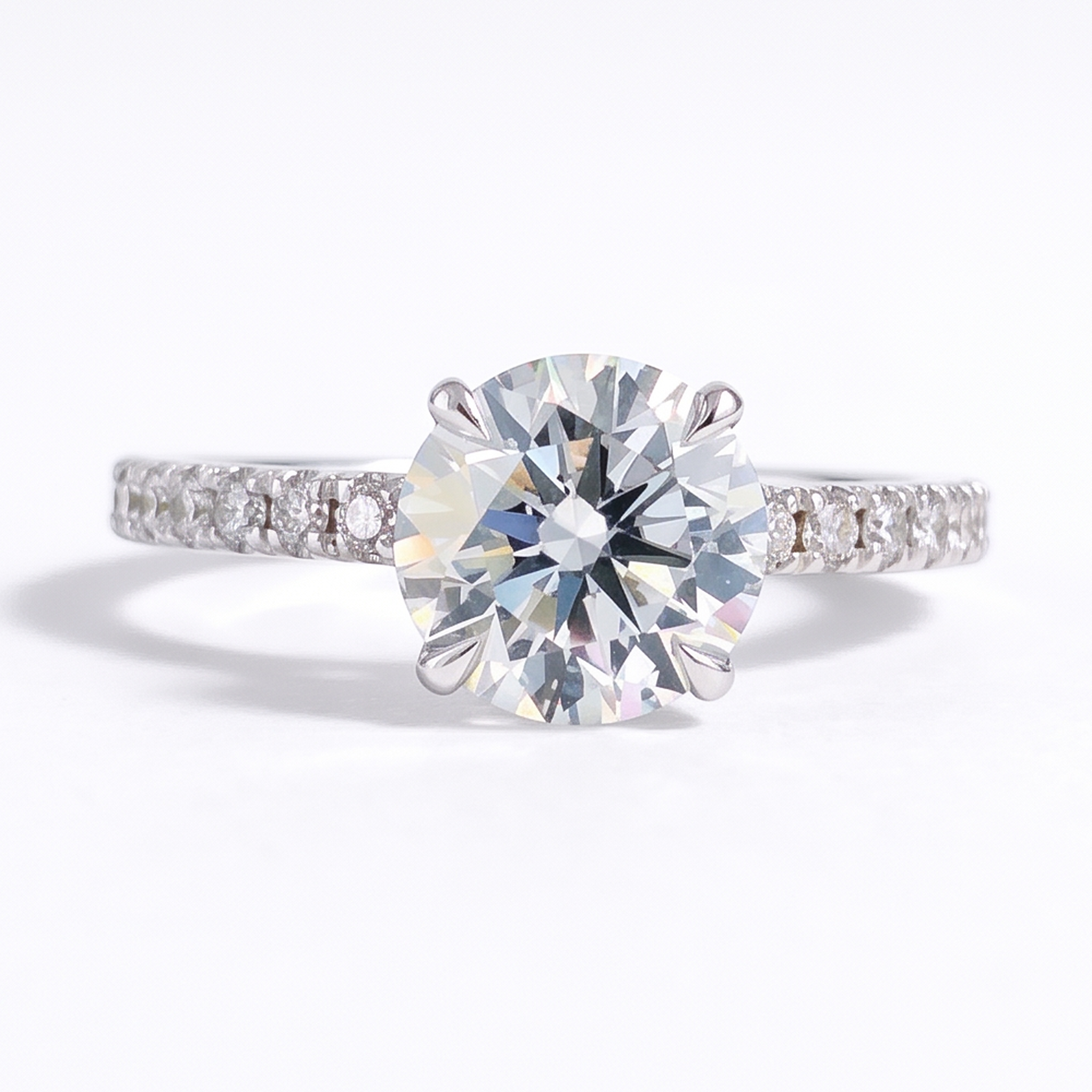2ct round brilliant lab grown diamond engagement ring, front view on a white studio background