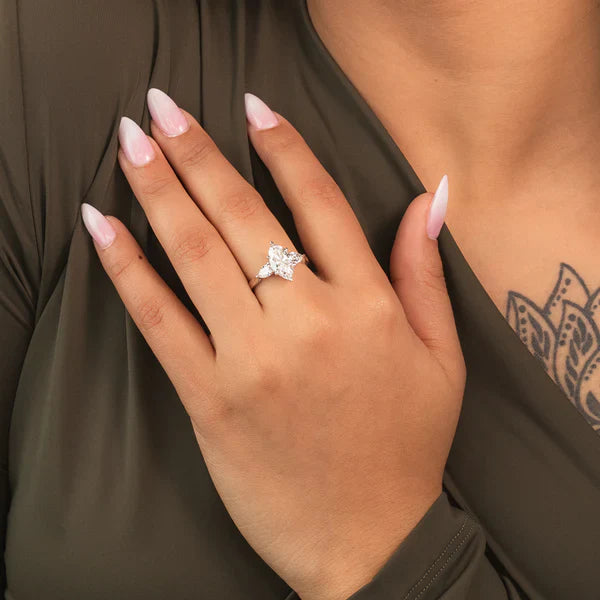 Lab diamond engagement ring in white metal worn on the hand, IGI certified