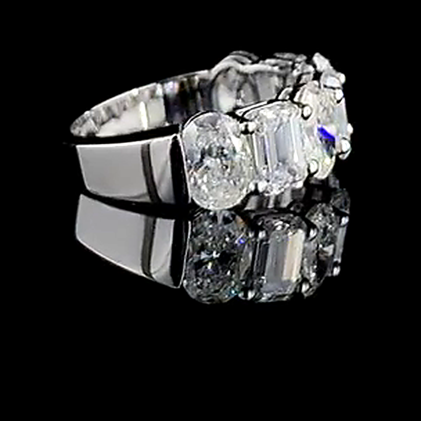 4.9ct oval and emerald cut half eternity lab grown diamond ring, real three quarter video frame