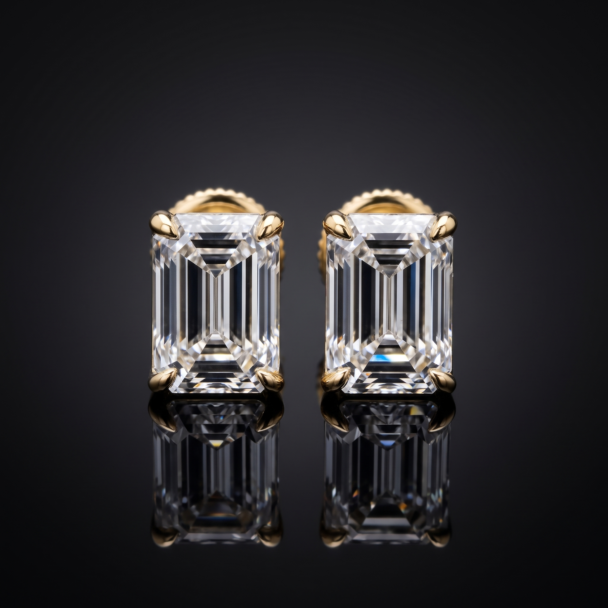 1ctw emerald cut studs lab grown diamond earrings, on a black background