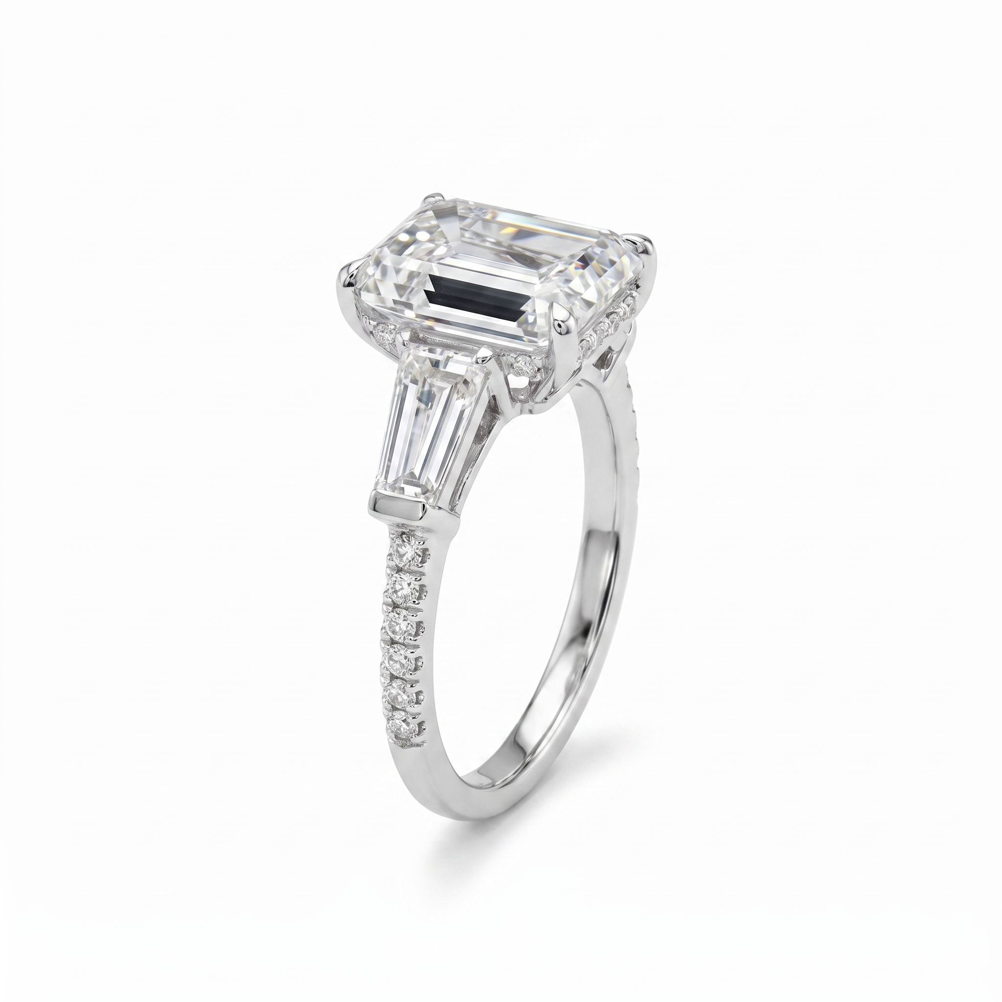 3ct emerald tapered baguette lab grown diamond ring, white gold, white background close up