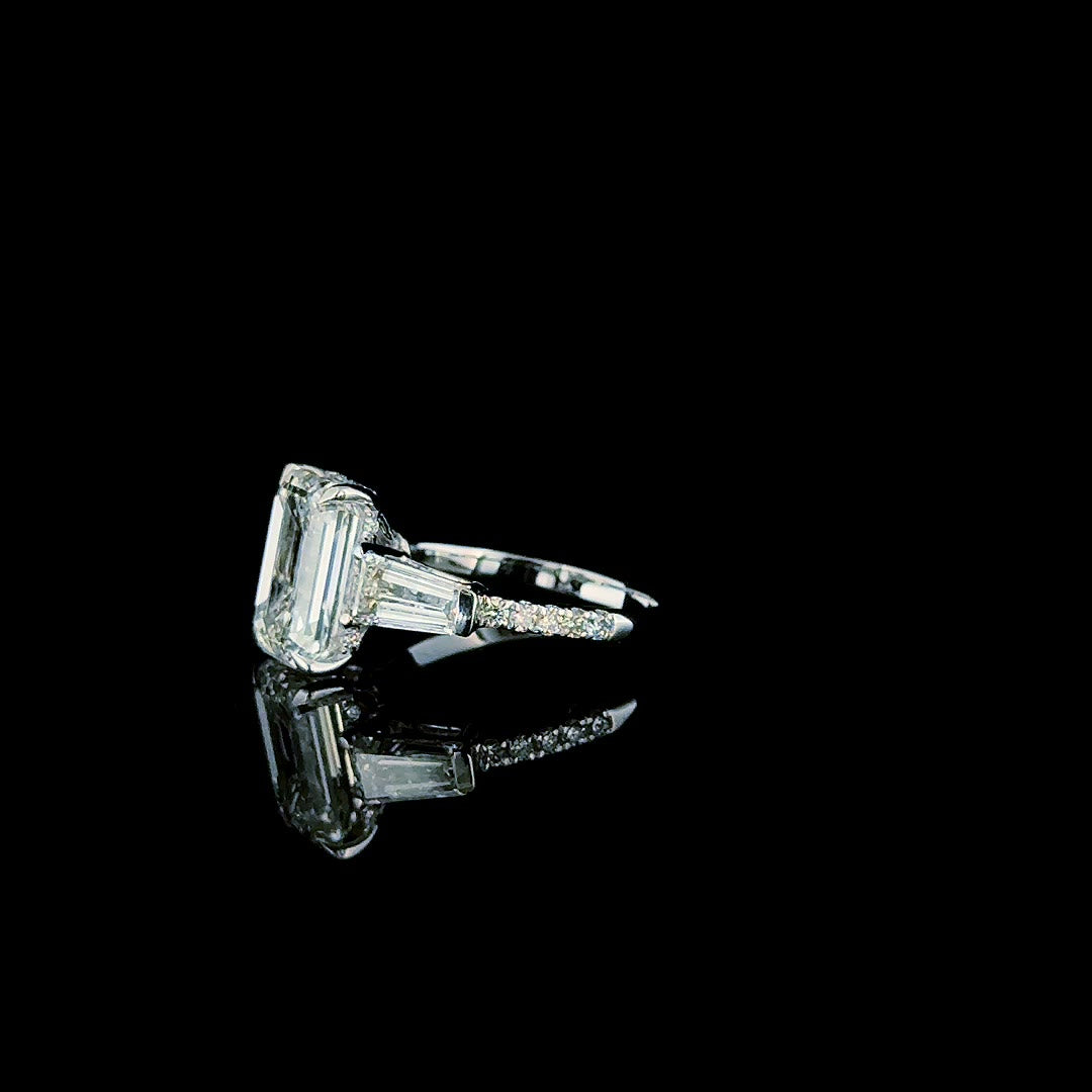 3ct emerald cut lab grown diamond ring with tapered baguette sides, product video still