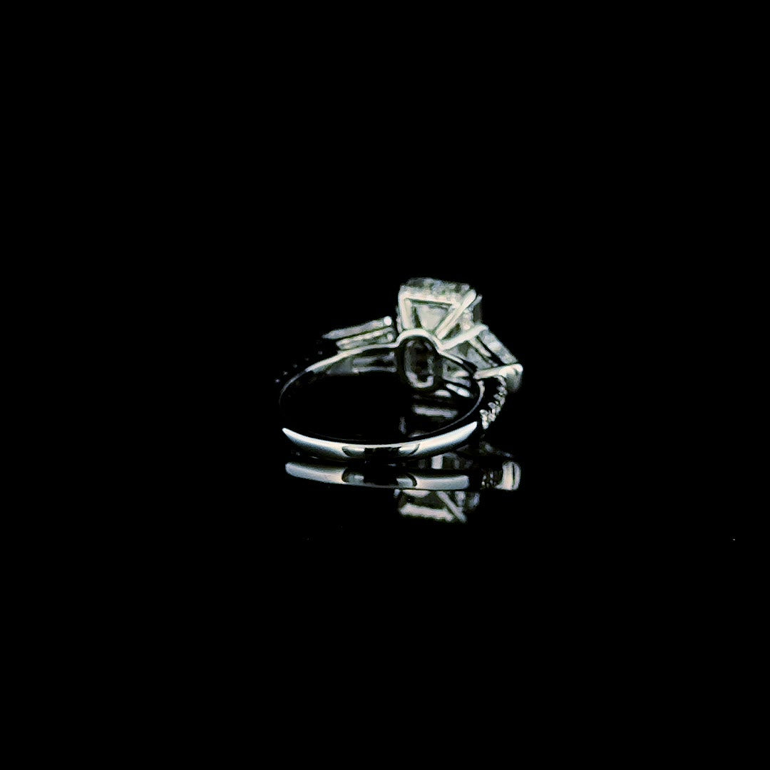 emerald cut lab diamond ring with tapered baguettes and pave band, angled view