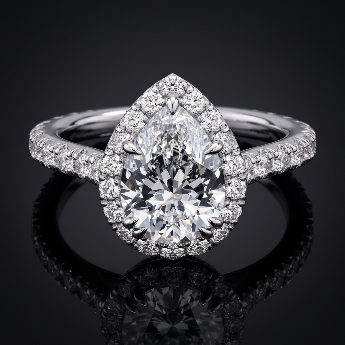 2.5ct halo lab grown diamond ring, on a black background