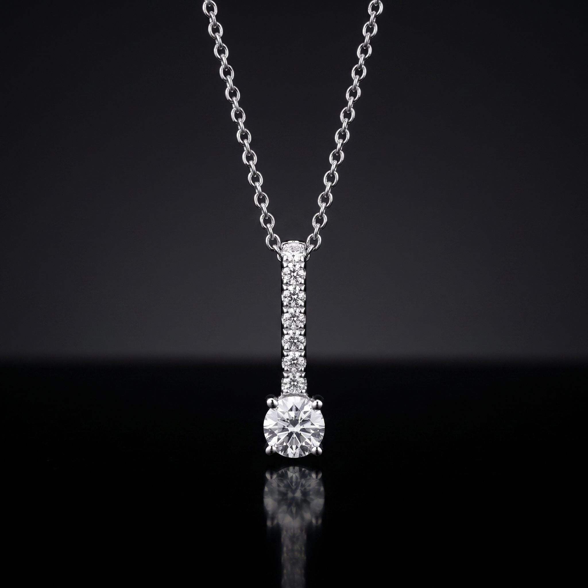 1.4ct drop pendant lab grown diamond necklace, on a black background