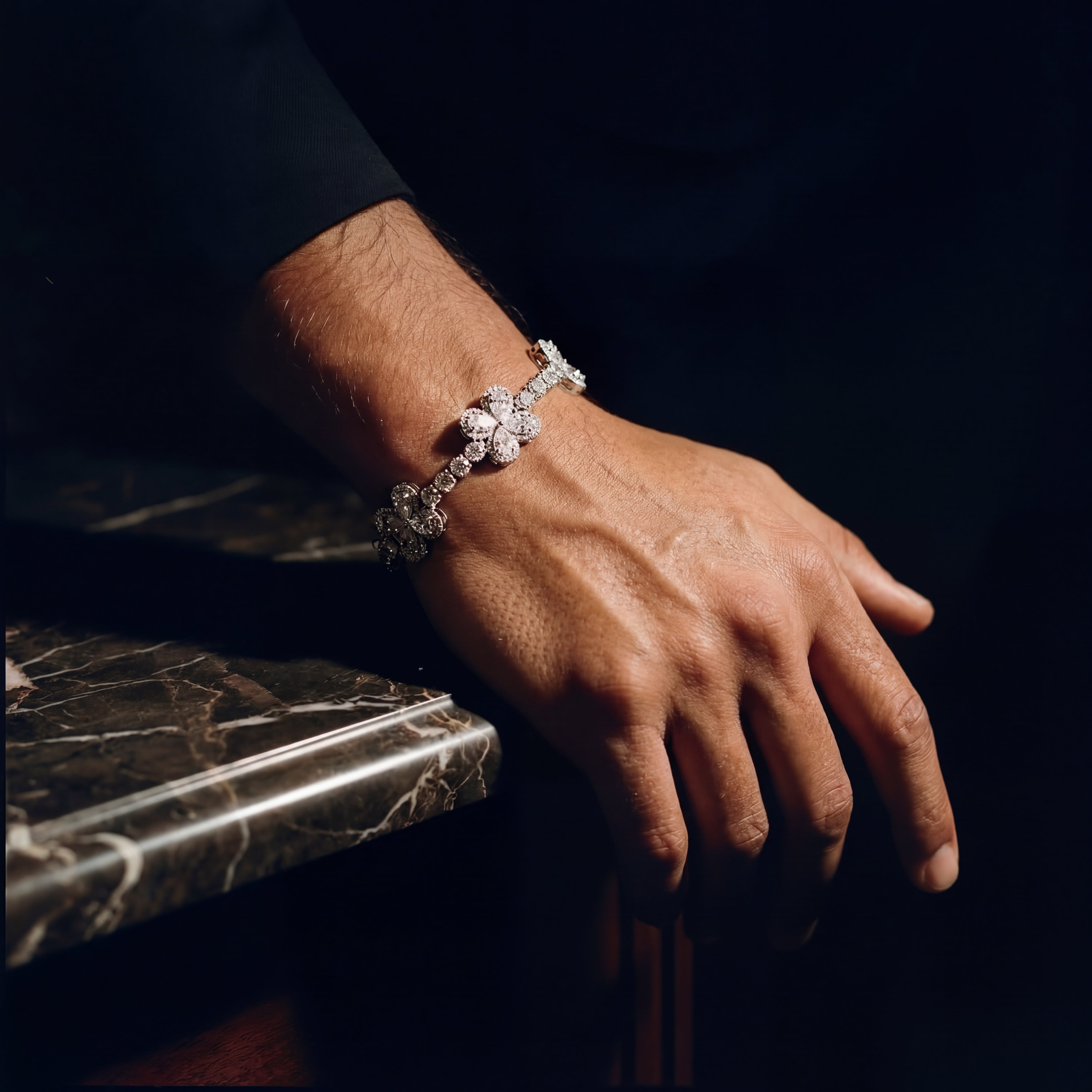The Clover mens lab diamond bracelet side view on hand | 24.54ct pear cut flower cluster | Draco Diamond