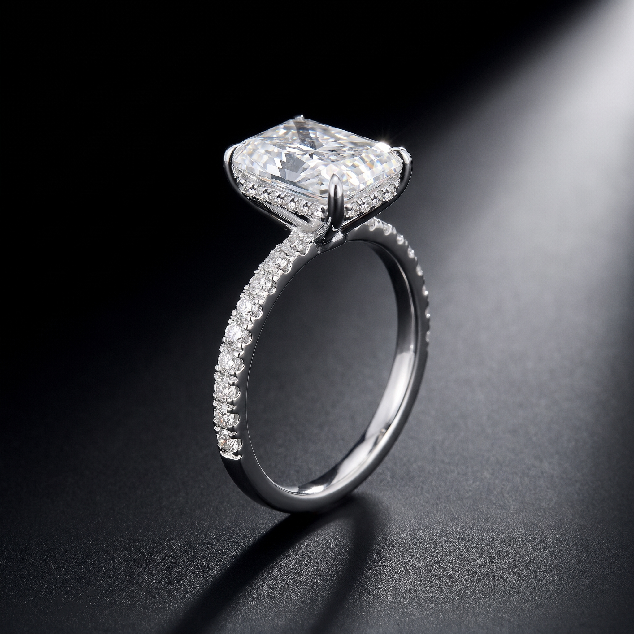 5ct radiant hidden halo lab grown diamond engagement ring, three quarter view on a dark reflective surface