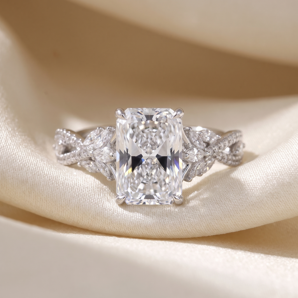 3ct radiant twisted vine lab grown diamond engagement ring styled on ivory silk