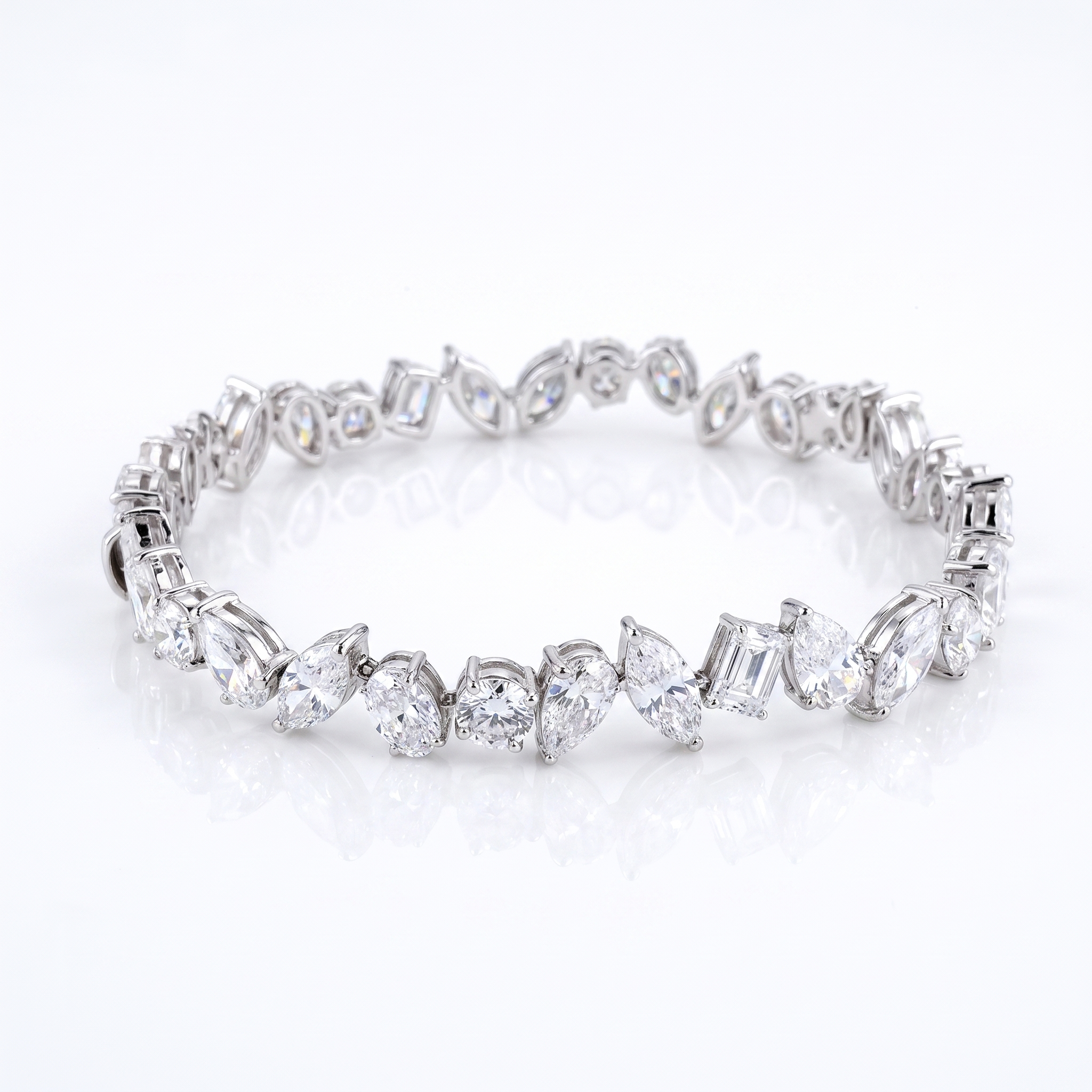 12ct mixed shape lab grown diamond tennis bracelet on white background, 14k white gold