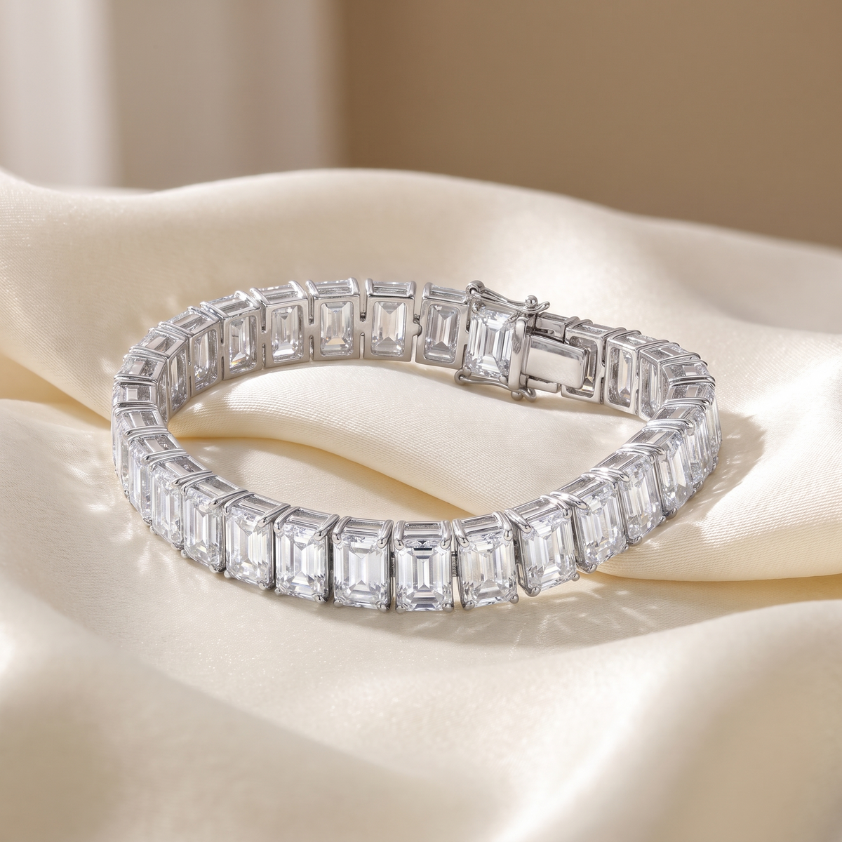 31.87ct emerald cut lab grown diamond tennis bracelet styled on ivory silk