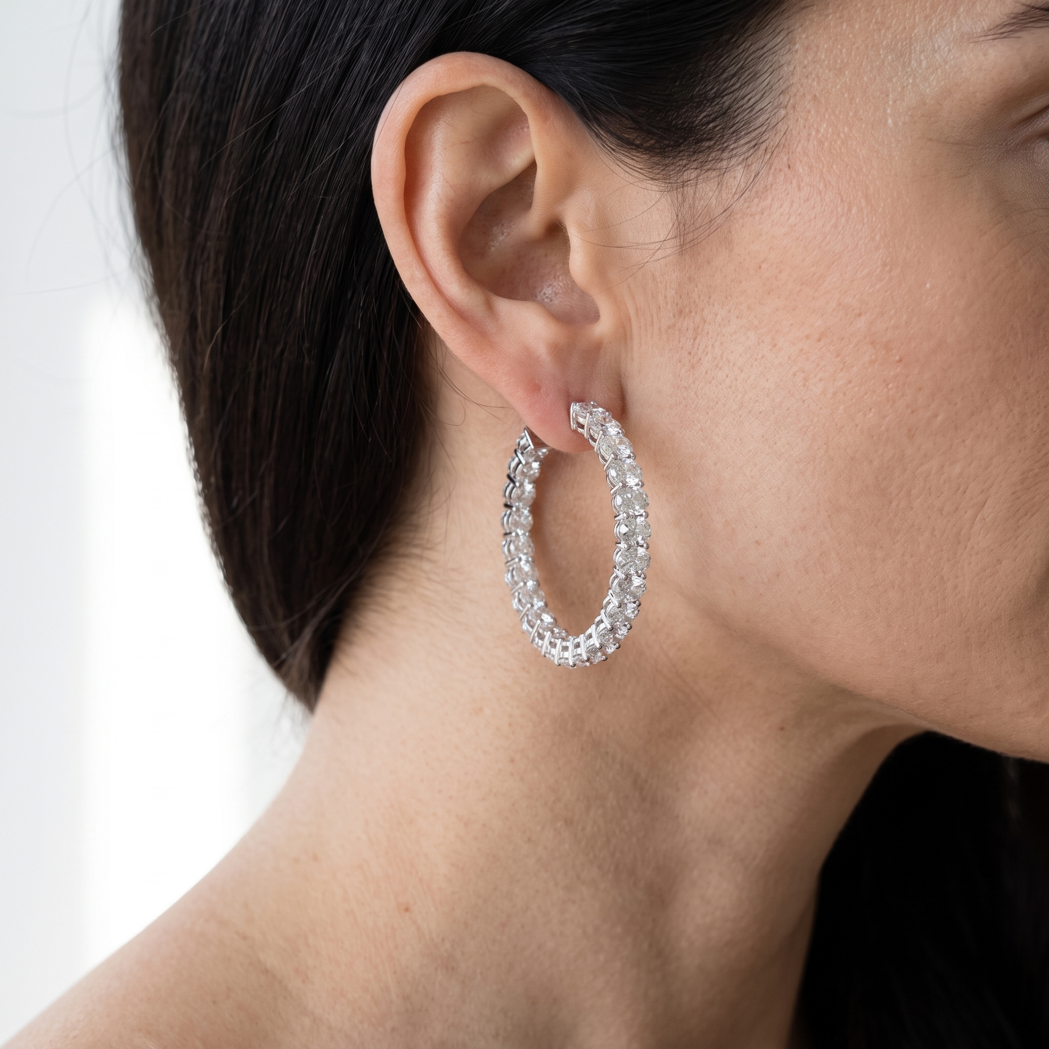 11ctw oval inside out lab grown diamond hoop earrings worn on ear