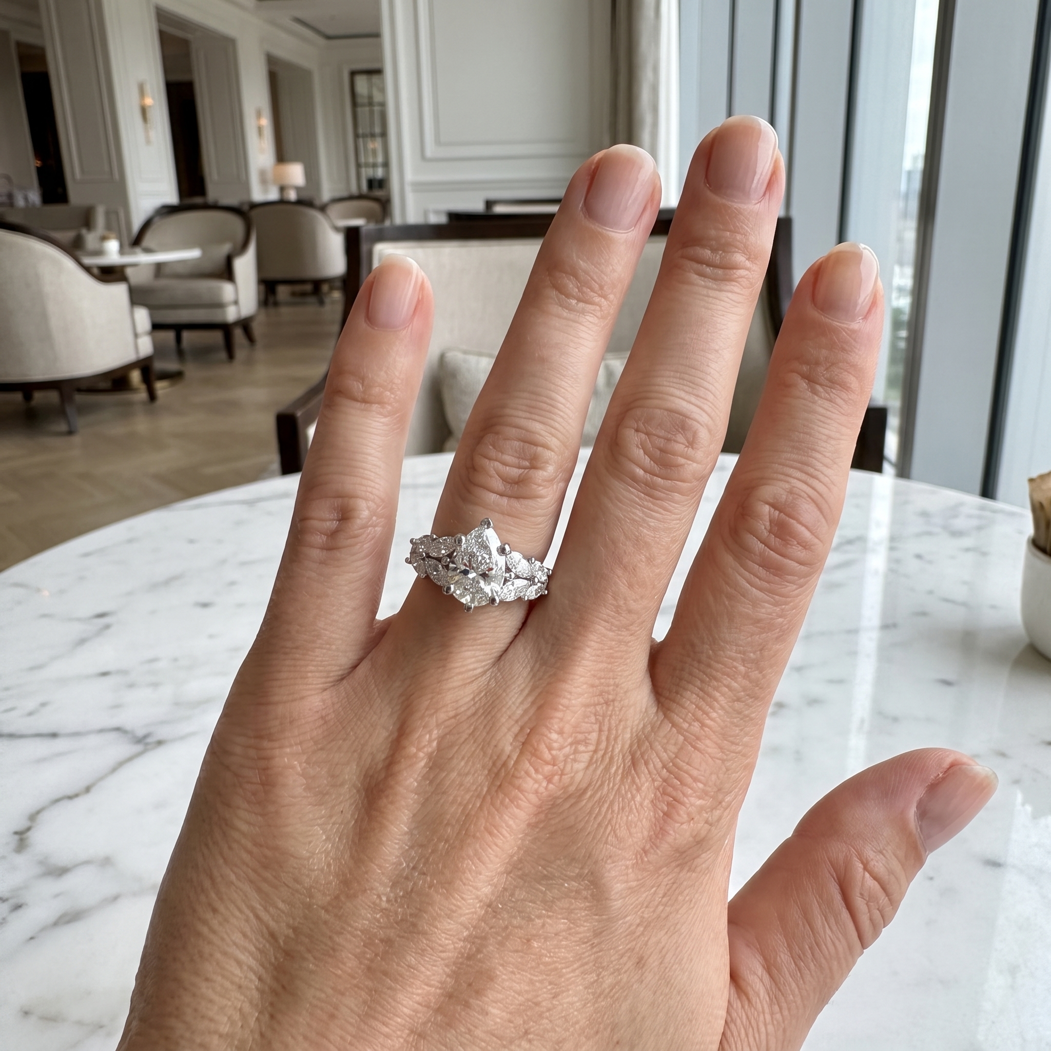 1.90ct pear lab grown diamond engagement ring shown worn