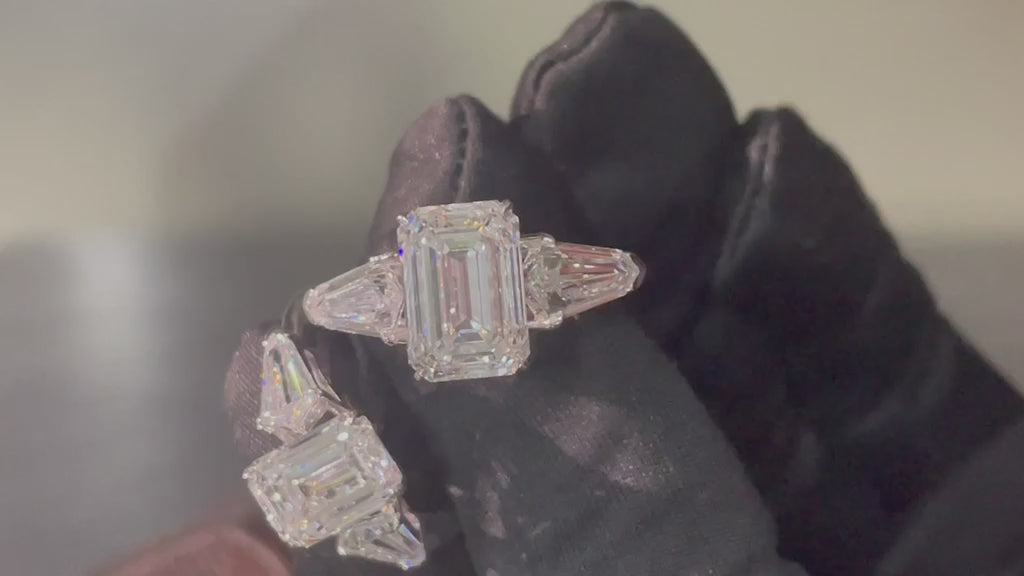 5ct emerald cut lab grown diamond ring with shield sides, rotating product video