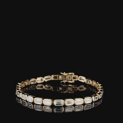 9ct emerald cut lab grown diamond tennis bracelet in 14k yellow gold, 360 degree turntable video