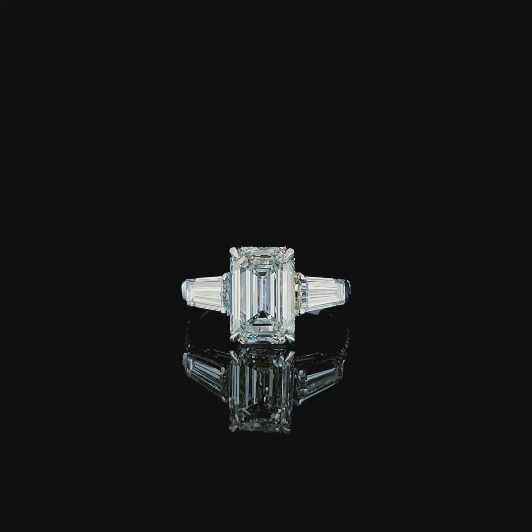 3ct emerald cut lab grown diamond ring with tapered baguettes rotating