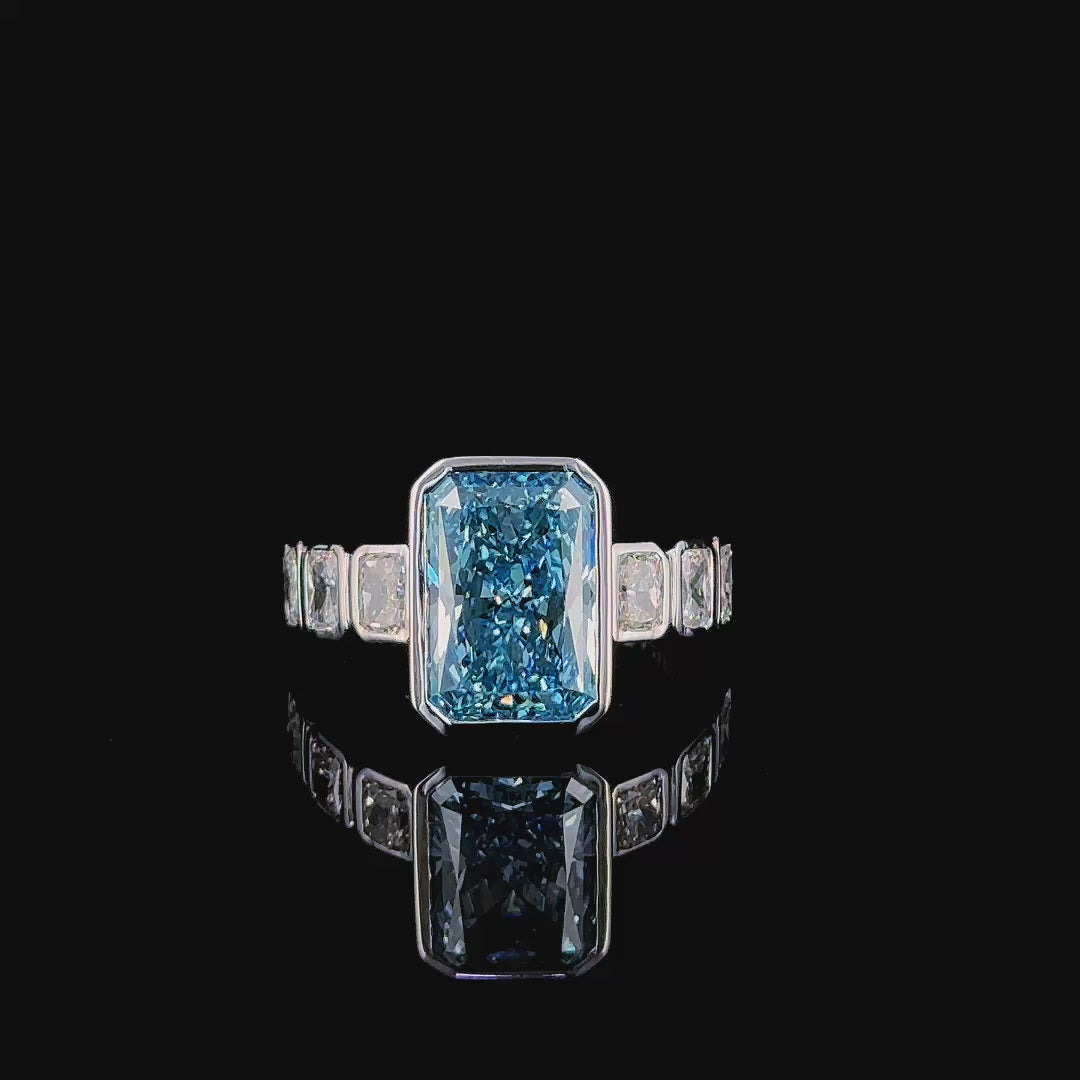 5.73ct fancy blue radiant lab grown diamond ring rotating on turntable