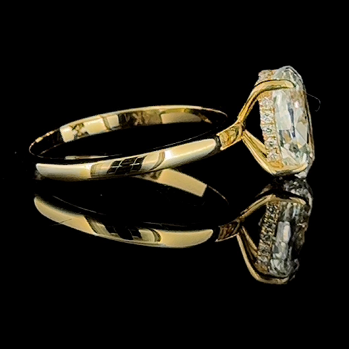 3ct oval lab grown diamond ring, 14k yellow gold, real video still on black, hidden halo and tapered band